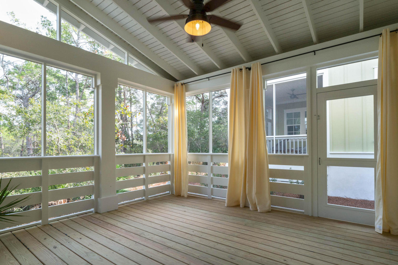 Screened in porch at Blue Mountain Beach home