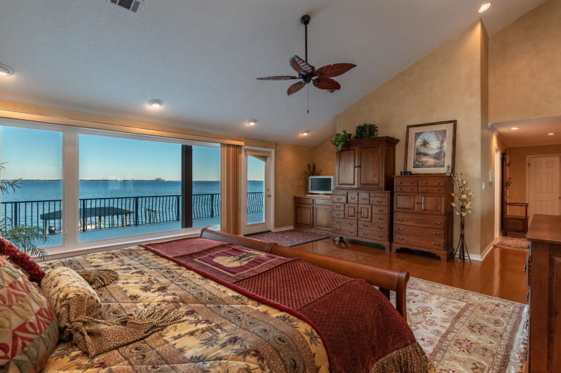 Master bedroom in Shalimar, FL waterfront home