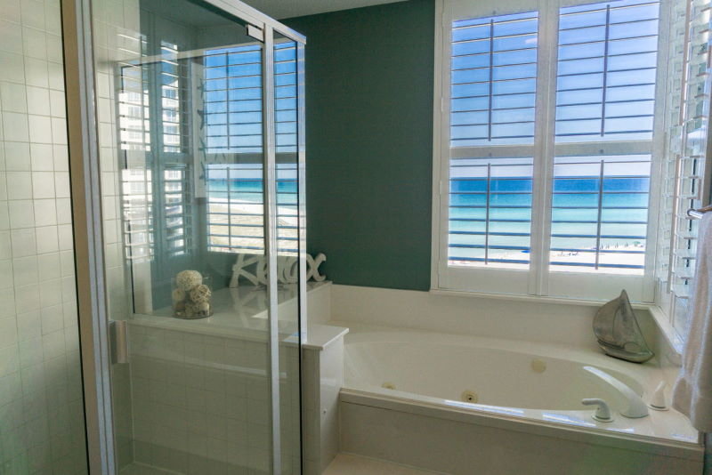 Master bath shower and soaker tub in Beach Colony condo, Navarre, FL