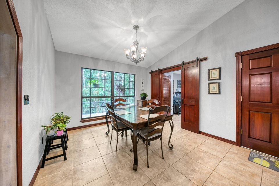 Eating area off kitchen in Niceville home