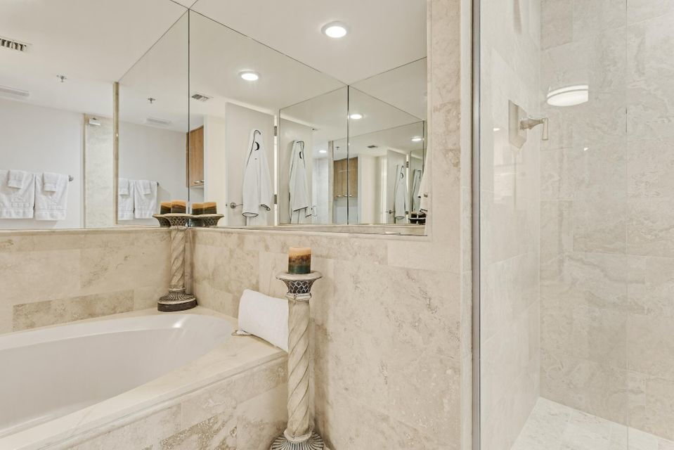 Shower & tub in East Pass Towers condo master bath